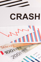 Currencies euro and downward graphs representing financial crisis caused by coronavirus. Global recession.