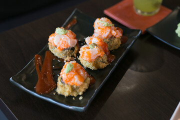 Set tempura maki sushi rolls fries - japanese food style. Hot fried Sushi Roll. Sushi menu. Japanese food. Hot fried Sushi Roll