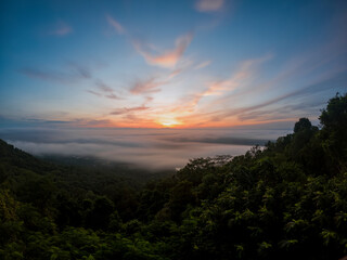 Chiang Mai city in Thailand is covered with mist, the morning sun shines.