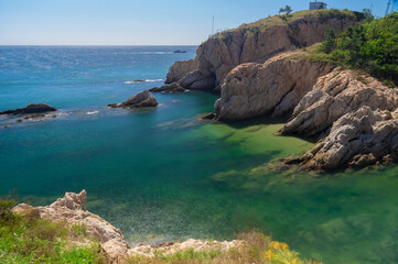 Obraz premium The scenery of Dalian Golden Stone National Geopark and Coastal Road in late Summer