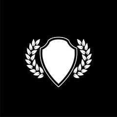 Shield with laurel wreath icon isolated on dark background