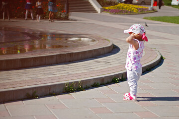 Children near a splashing fontain in the center of town 12 June 2016 Pyatigorsk, Russia, Town Square