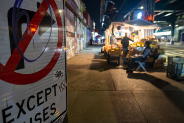 Fototapeta premium NYC parking sign and street photograph