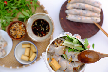people have breakfast at home with homemade vegan Vietnamese rice noodles roll on food background