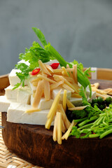 Raw material for fried tofu cook with sauce and ginger, simple homemade vegan food