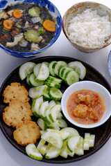 vegan daily meal for lunch, cucumber slice with tofu cheese, seaweed soup, rice bowl, simple vegetarian Vietnamese food