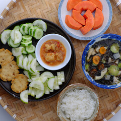 vegan daily meal for lunch, cucumber slice with tofu cheese, seaweed soup, rice bowl, simple vegetarian Vietnamese food
