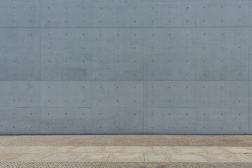 Textur von Beton. Material für Wand, Boden oder Hintergrund. Sichtbeton und Kopfsteinpfalster


