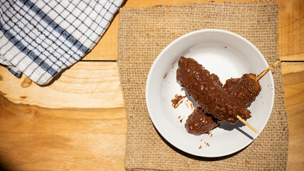 Banana coasted by chocolate which is very sweet