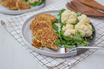 golden fried rosti pile from cauliflower and parmesan cheese