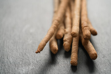 Traditional italian snack - grissini on concrete surface