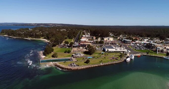 Waterfront of Huskisson town on Jervis bay white sandy beaches coast in 4k.
