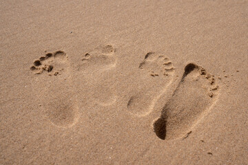 Fototapeta na wymiar Fußabdrücke im Sand 2. Footprint in sand