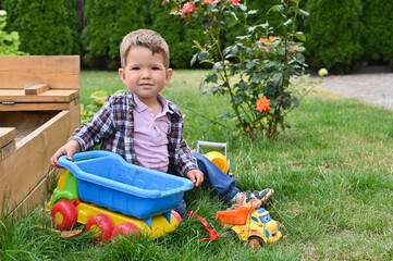 Portrait of a little boy on the playground.