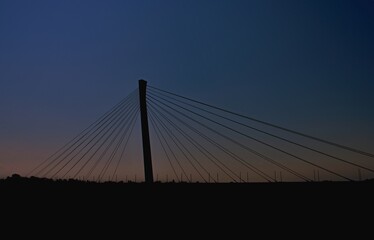 Silhouette of a new bridge in the town of Komárno / Slovakia /. The highest bridge on the Danube is in Komárno.