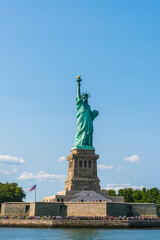 Fototapeta premium The statue of Liberty with blue sky background.