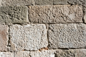 Old weathered brick wall fragment