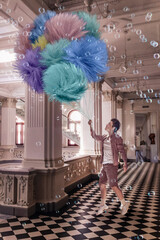 Man with big balloons and bubbles