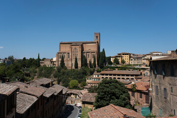 Fototapeta na wymiar Scenery of Siena in Tuscany, with view of the Dome and Bell Tower of Siena Cathedral Duomo di Siena