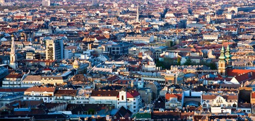 Aerial cityscape in Budapest, one of the largest cities in EU.  Beautiful houses with nice tile roofs under the evening sun.