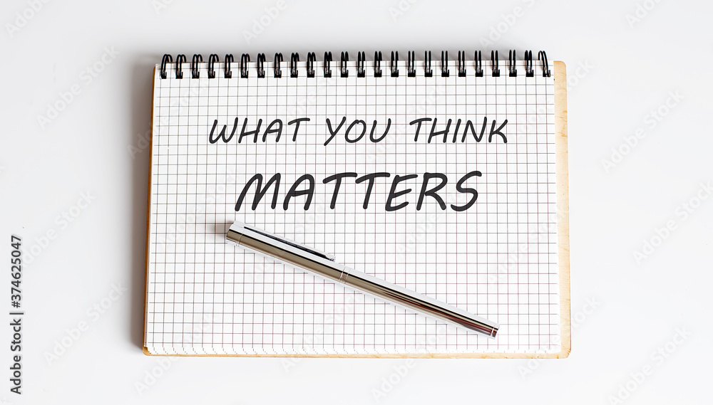 Poster the question what do you think text on the notepad with pen