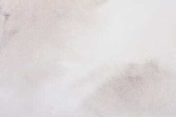 Light gray watercolor painted background.