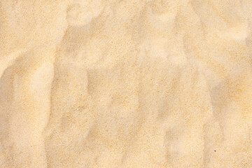Sand texture as background in summer sun