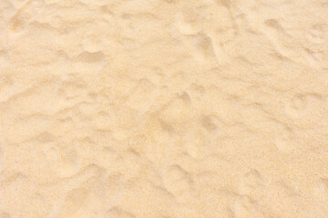 Fototapeta na wymiar Beach sand texture in summer day as background