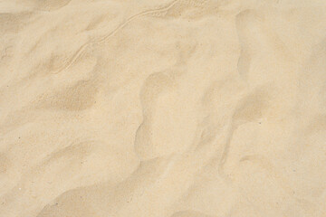 Fototapeta na wymiar Beach sand texture in summer day as background