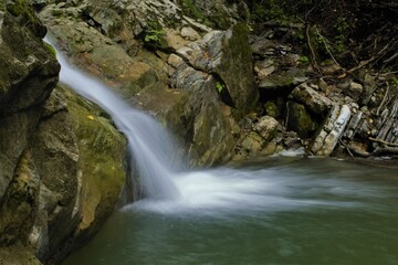 Fototapeta na wymiar small waterfall in the Carpathian mountains