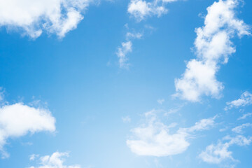 Naklejka na ściany i meble Blue sky and white clouds as background.