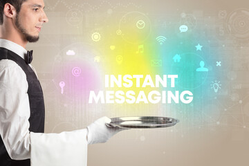 Waiter serving social networking with INSTANT MESSAGING inscription, new media concept