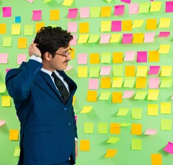 Businessman with many business priorities