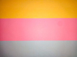 Pink, yellow and gray paper Put as background