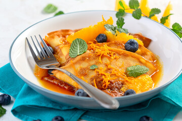 Traditional thin crepes Suzette.
