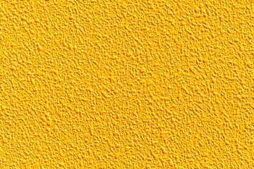 Rough cement wall painted yellow texture and seamless background , Concrete wall texture and background