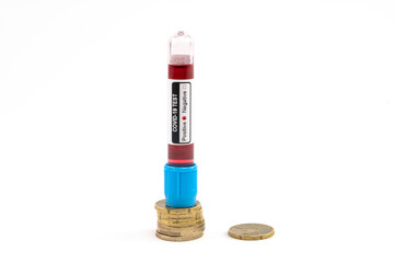 Euro money - coins and coronavirus (covid-19) blood sample