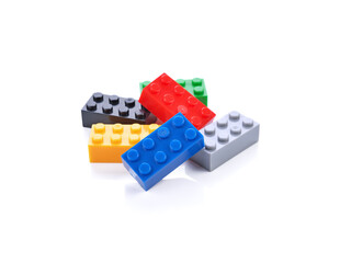 Plastic toy blocks on white background