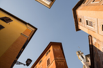 Fototapeta na wymiar Architecture of Rome city, facades of tenement houses against the sky