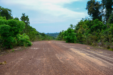 Fototapeta na wymiar The view of the jungle and the main road on Koh Rong island in Cambodia