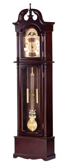 Wooden brown standing clock on white background