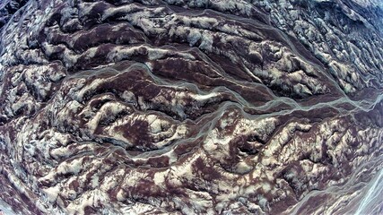 View from above of the rugged rocky landscape between Ica and Arequipa in Peru. Wild, rough nature pure. There are no places, no streets, no houses.
