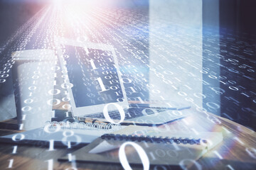 Double exposure of desktop computer and technology theme hologram. Concept of software development.