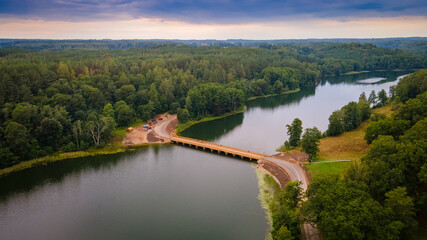 Fototapeta premium Aerial view of wooden bridge in Dubingiai by drone