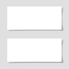 Mok-up of two narrow horizontal flyers with shadow on a gray background. Template for the presentation of banners, posters, postcards and invitations. Vector illustration.