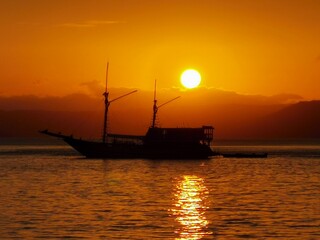 Fototapeta premium Sunset Boat in Indonesia