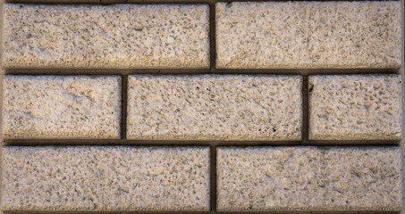 Plaster brick wall background, dark yellow color wall.