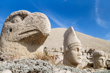 Stone heads of Eagle, King Antiochus & goddess Tyche on famous mount Nemrut, Kahta, Turkey. Burial complex was built in 65 BC. Heads fell from their pedestals during earthquake. Now it's UNESCO object