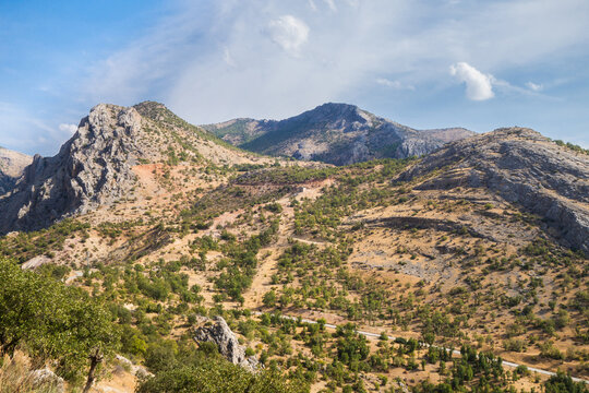 Panoramic view onto Taurus mountains & montane valleys in Kahta district, Turkey. Picture taken from mountain in ancient city Arsameia