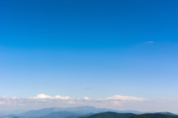 Obraz na płótnie Canvas Traveling by the Carpathians. Polonyna Runa, Gostra, and other peaks. Spring, Summer and Autumn rest in the Carpathians. Green, Blue colors. Forest and meadows.
